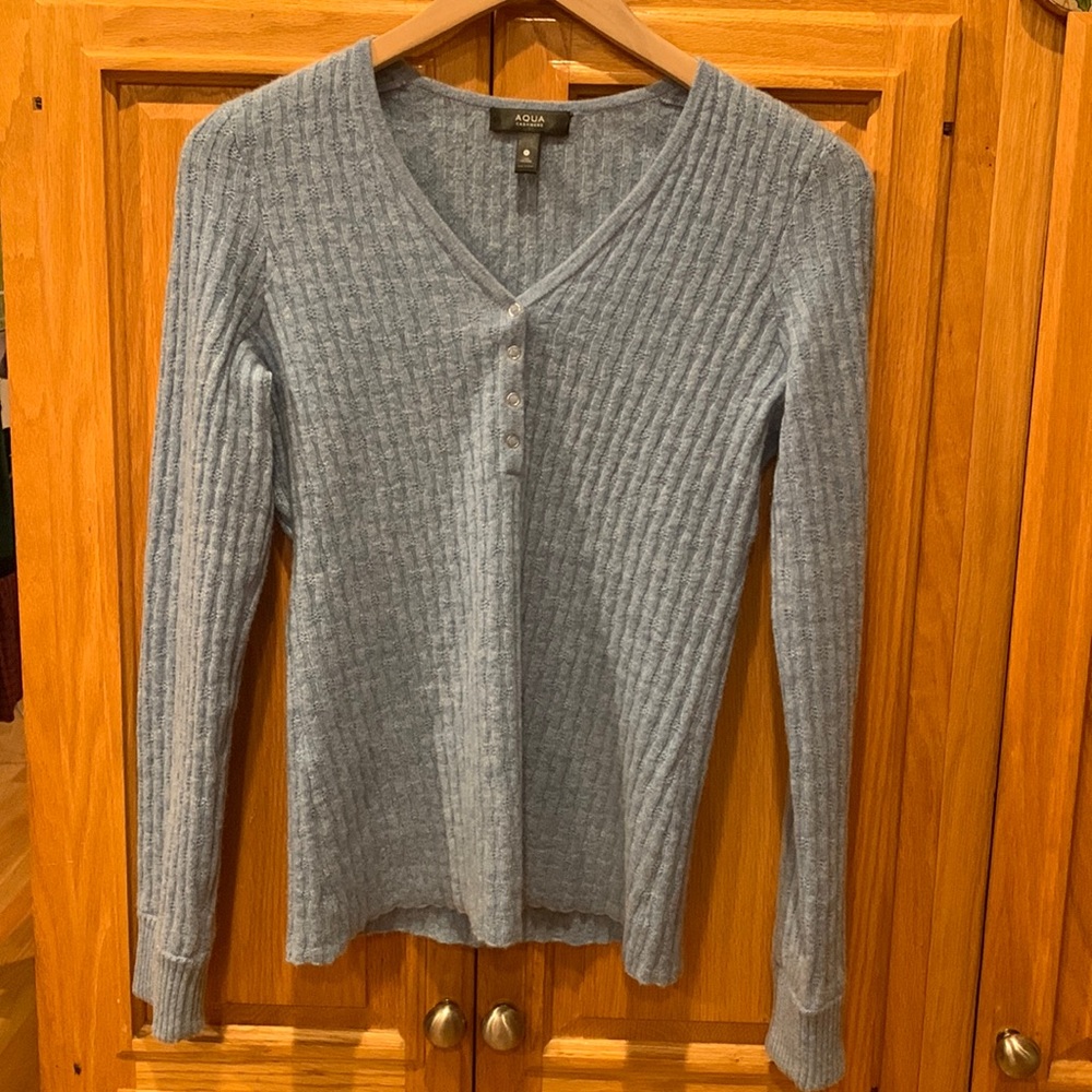 Light blue 100% cashmere sweater with buttons, worn once and in new condition